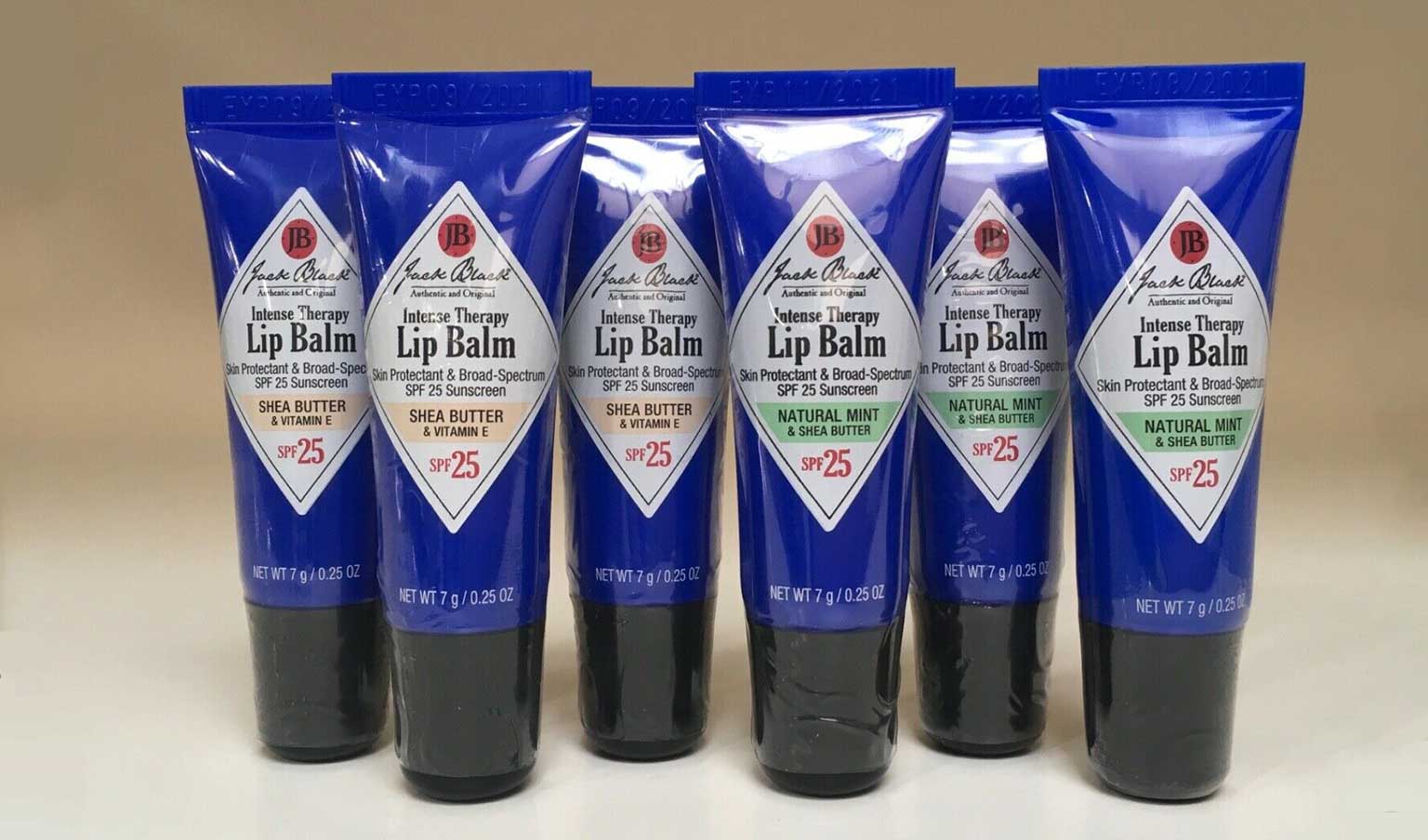 several tubes of different flavors of Jack Black's lip balm